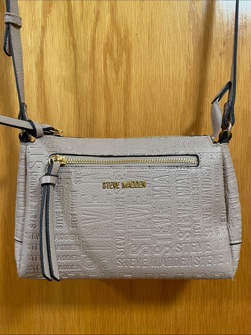 Steve Madden embossed logo crossbody bag beige long adjustable strap